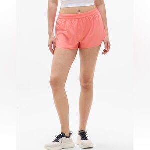 Athleta Speedwork mid rise 2.5 inch run short Mimosa Pink medium NWT